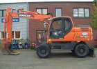 Колесный экскаватор DX160W