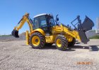 Экскаватор-погрузчик NEW HOLLAND B100